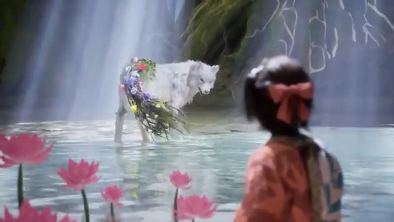 Koo stands beside a waterfall in an official Beast of Reincarnation Xbox trailer frame